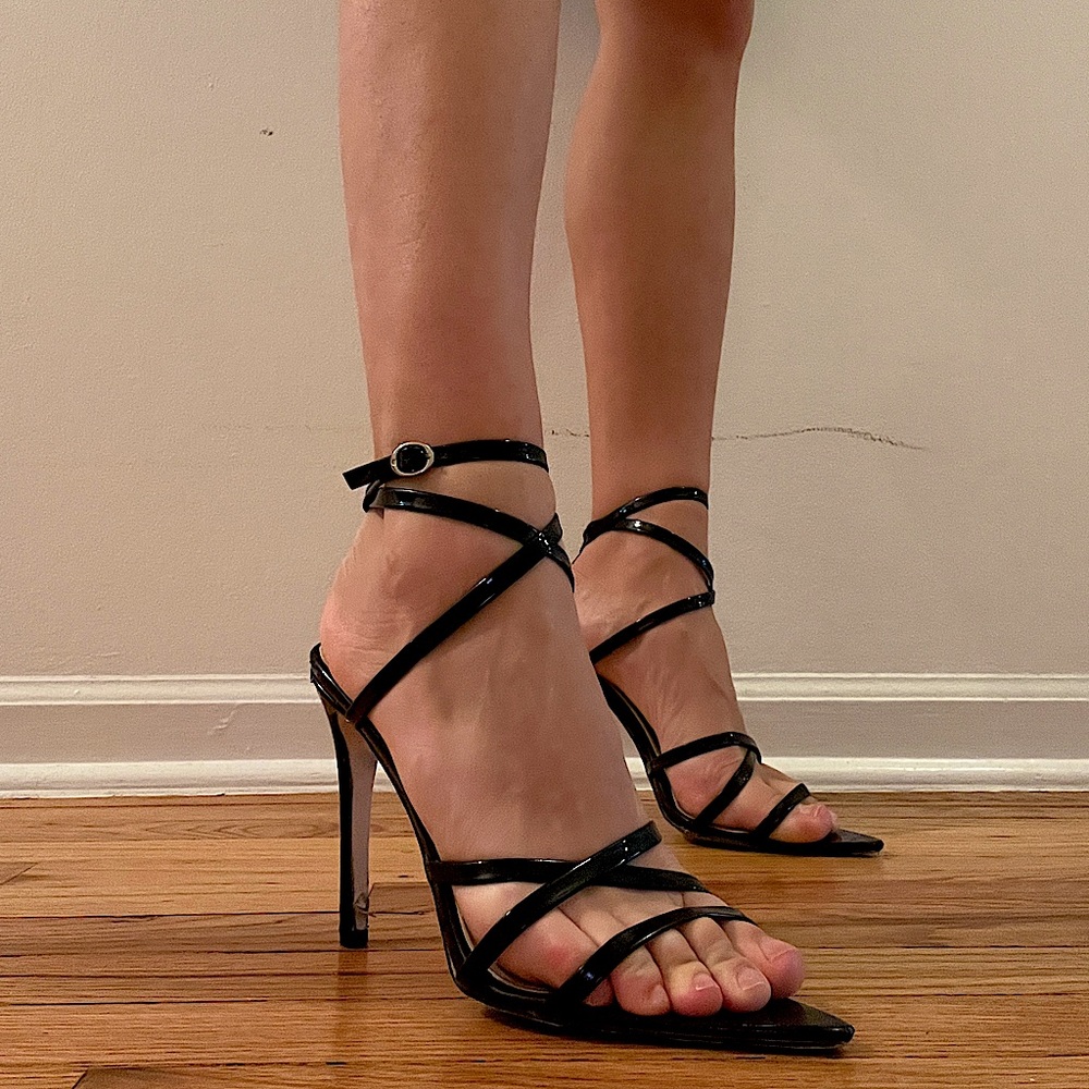 Black strappy pointed toe heel.